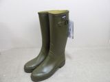 a pair of green rain boots sitting on top of a white floor