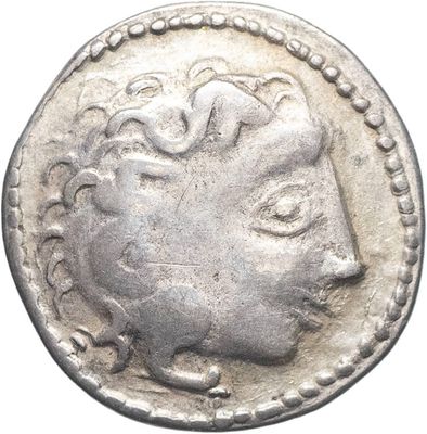 une pièce de monnaie en argent portant l'image d'un visage de femme