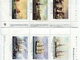 the stamps are of different sizes and colors on a sheet of paper