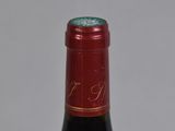 a bottle of wine that is sitting on a table