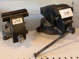 two vises that are sitting on a table