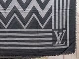 an image of a black and white blanket hanging on a wall