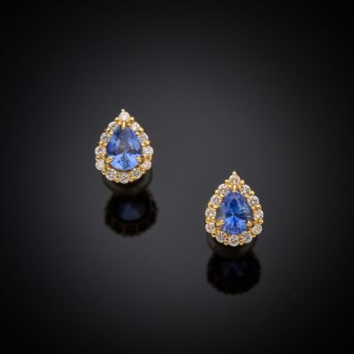 a pair of sapphire and diamond earrings