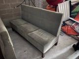 a couch that is sitting on a table in a room
