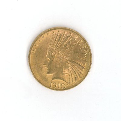 une pièce d'or sur laquelle est représentée une tête d'Indien