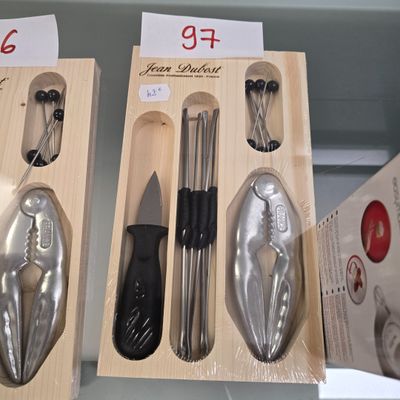 three boxes with different types of kitchen utensils in them