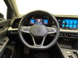 the interior of a car with a steering wheel and dashboard controls