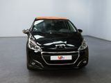 the front view of a black car in a white room