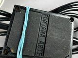 a black and blue cord that is connected to a power supply