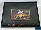 a picture of a framed picture of a race car