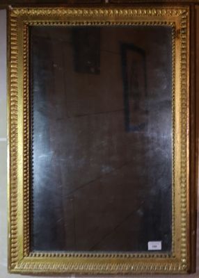 Glace en bois stuqué sculpté doré de rangs de feuilles d'eau… - Photo 1