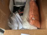 a cardboard box with a lot of items inside of it