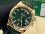 a watch that is being held by a glove