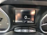 a close up of a car dashboard with a speedometer
