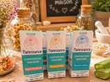 Trois bouteilles de Talessance sont posées sur une table.