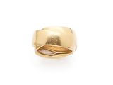 a close up of a gold ring on a white background