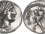 a close up of a coin with an image of a woman on it