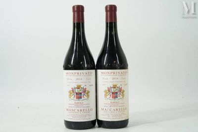 two bottles of wine sitting next to each other on a white surface