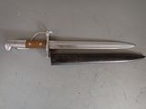 a knife that is laying on top of a table