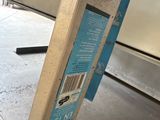an image of a piece of furniture that is in the process of being installed