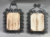 pair of antique iron and wood mirrors with scroll design