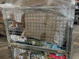 a cart with a lot of items in it in a warehouse