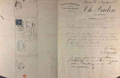an old document with writing on it sitting on a table