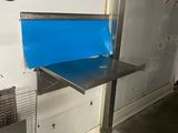 an image of a blue bench in a room