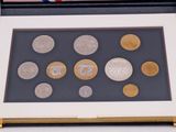 a picture of a display case with coins in it