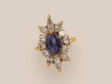 a sapphire and diamond cluster ring