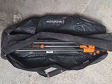 a black bag with a pair of tools inside of it