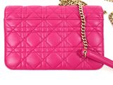 pink quilted purse with chain strap on a white background