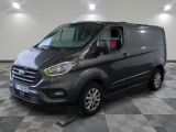the new ford transit van is parked in a large room