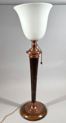 an image of a table lamp with a white glass shade on it