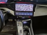 the dashboard of a car with a gps device in the center