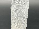 an image of a glass vase with a design on it