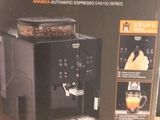 packaging for a krups coffee machine sitting on a table