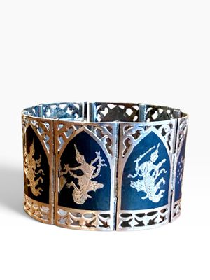 an image of a bracelet with a dragon and a dragon on it