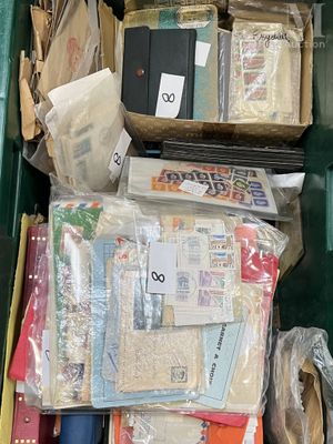 a green box filled with lots of different items