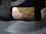 a label on a shoe that is in a bag