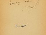 an old book with writing on it with a picture of a cat