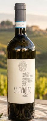 a bottle of wine that is sitting on a table