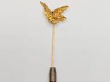 an image of a gold butterfly lapel pin on a white background