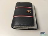 leather wallet with a red, white, and blue stripe on the front