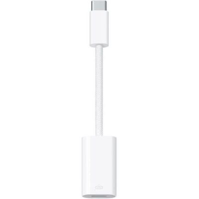a close up of a white usb cable connected to an iphone