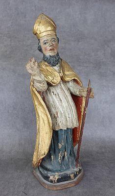 Saint évêque en bois sculpté polychrome et or.