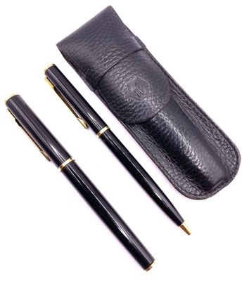 a black pen and a black case on a white background