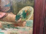 a painting of a woman laying on a bed with a frisbee