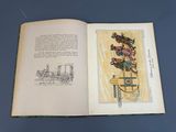an open book with a drawing of a man riding a horse