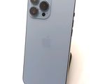 a close up of an iphone with a camera attached to it